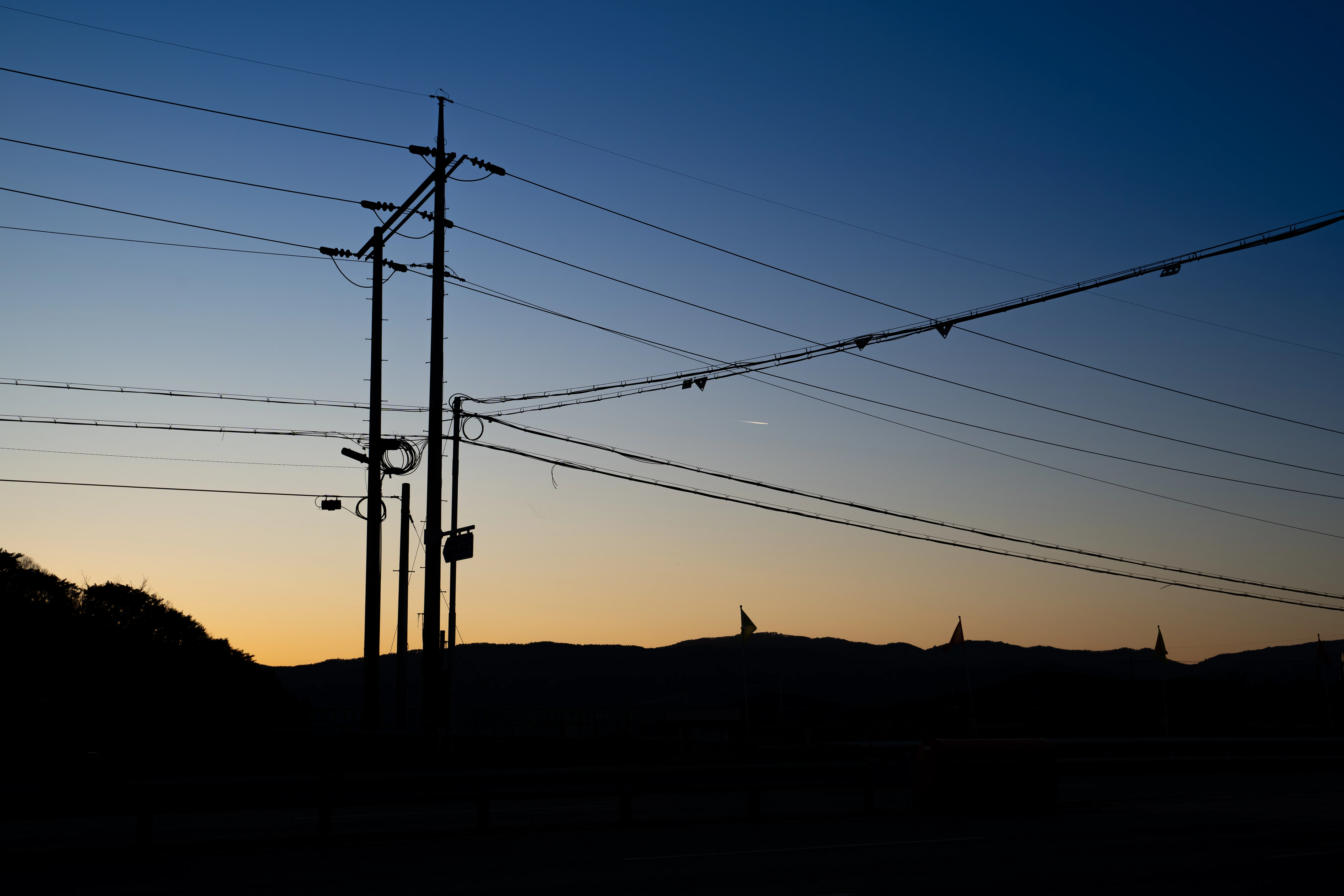 Tranquil Dusk Beyond Power Lines