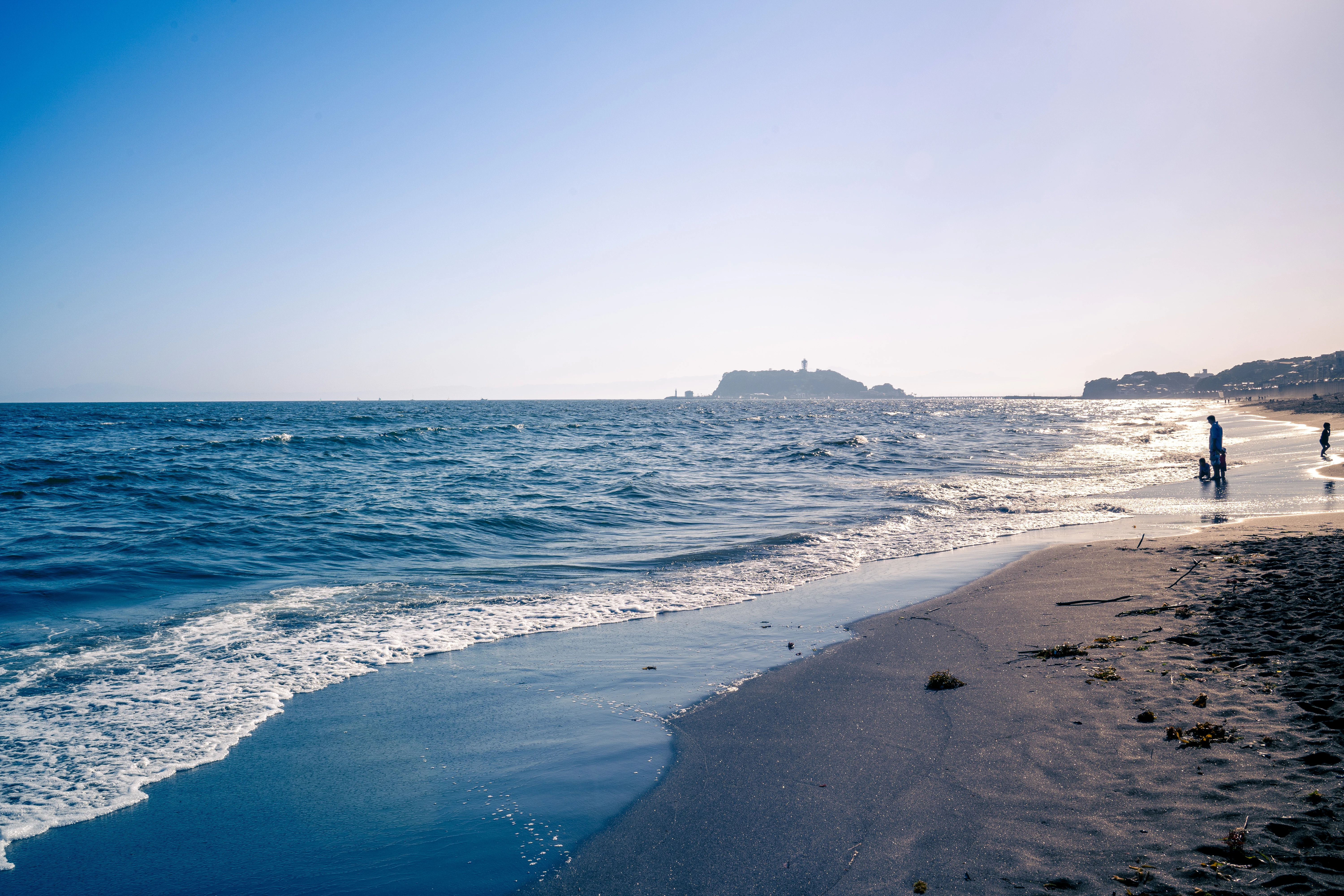 Idyllic Waves by the Shore of Enoshima Island