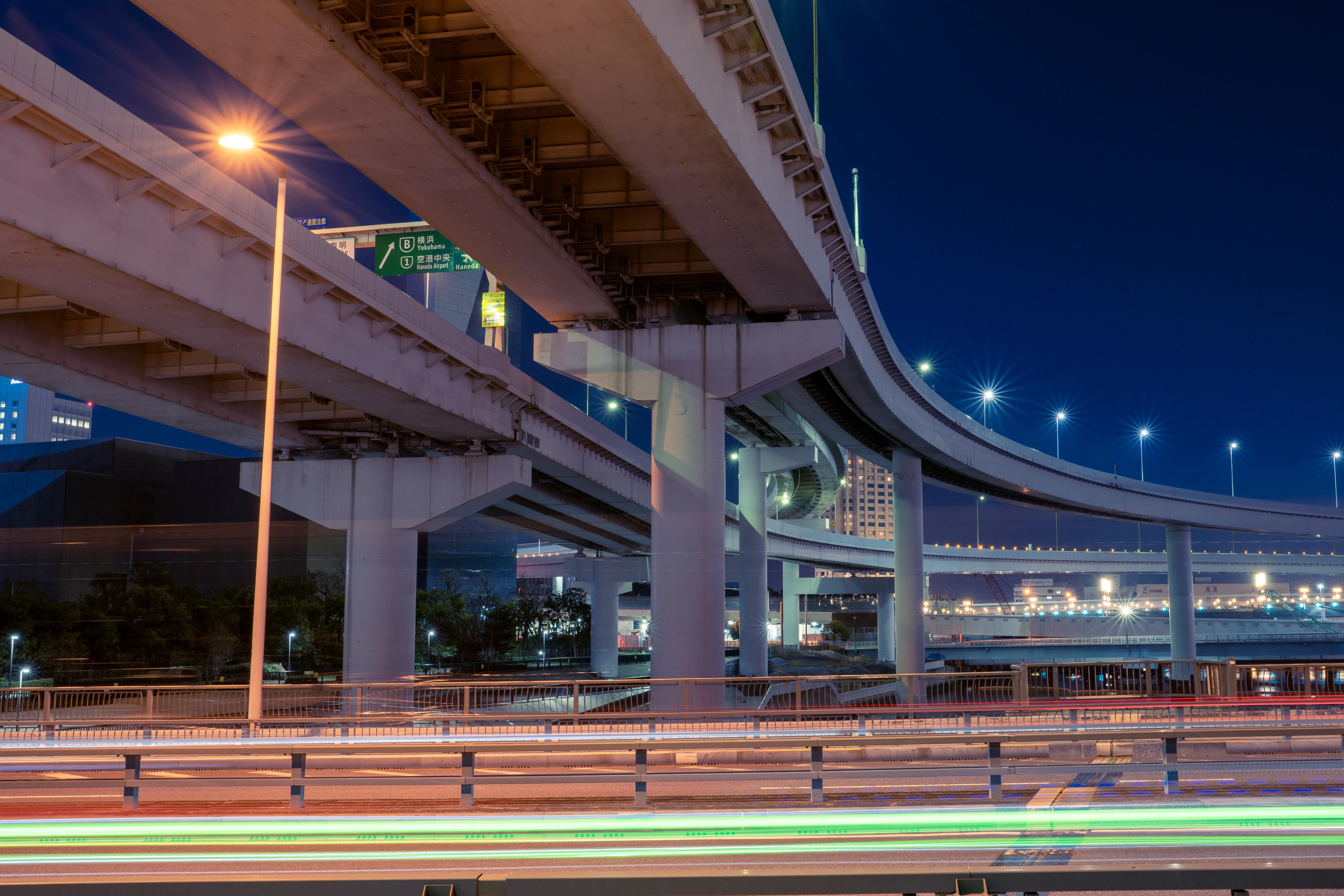 Nighttime Urban Overpass with Blazing Trails of Light