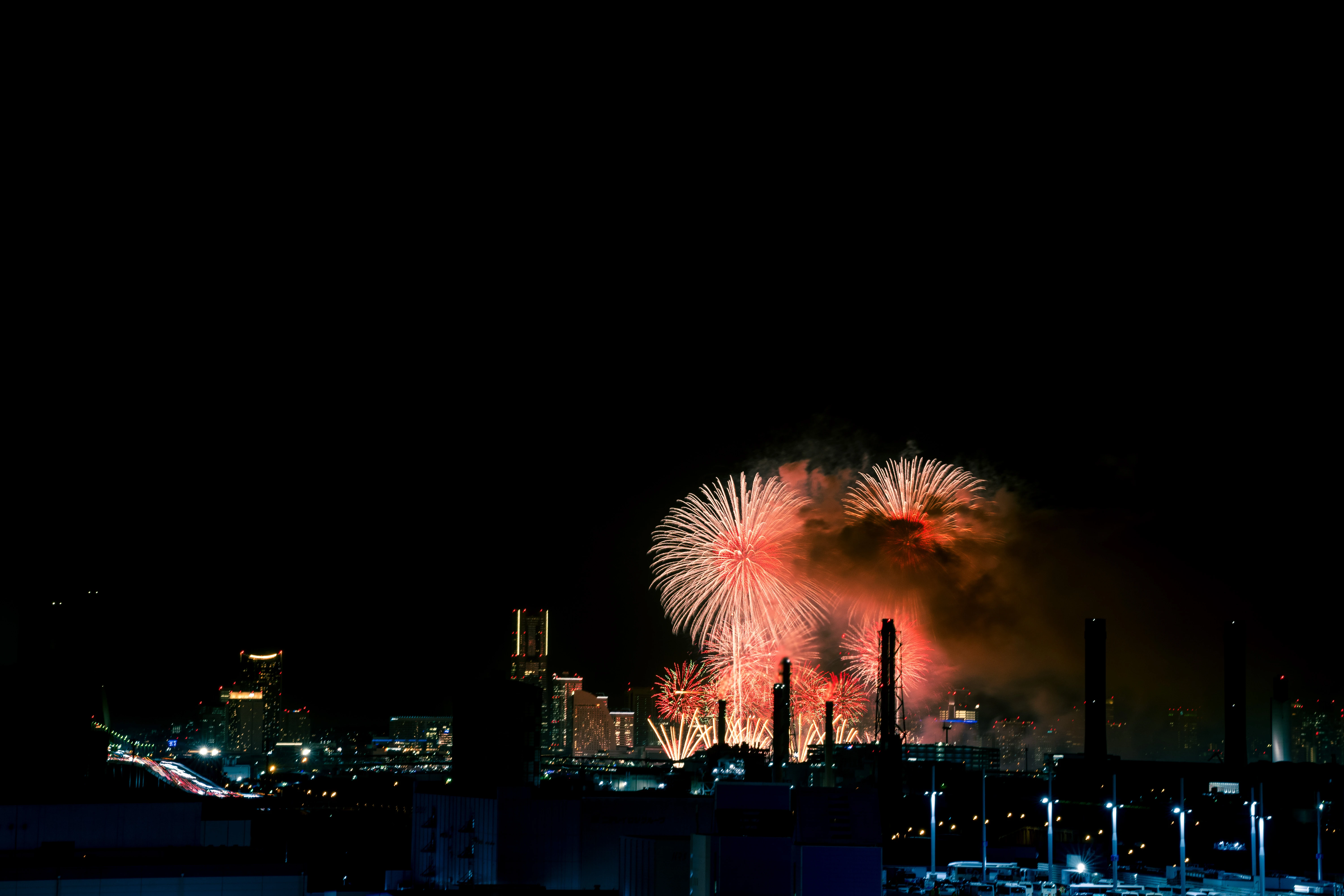 Vibrant Fireworks Illuminate the Urban Skyline