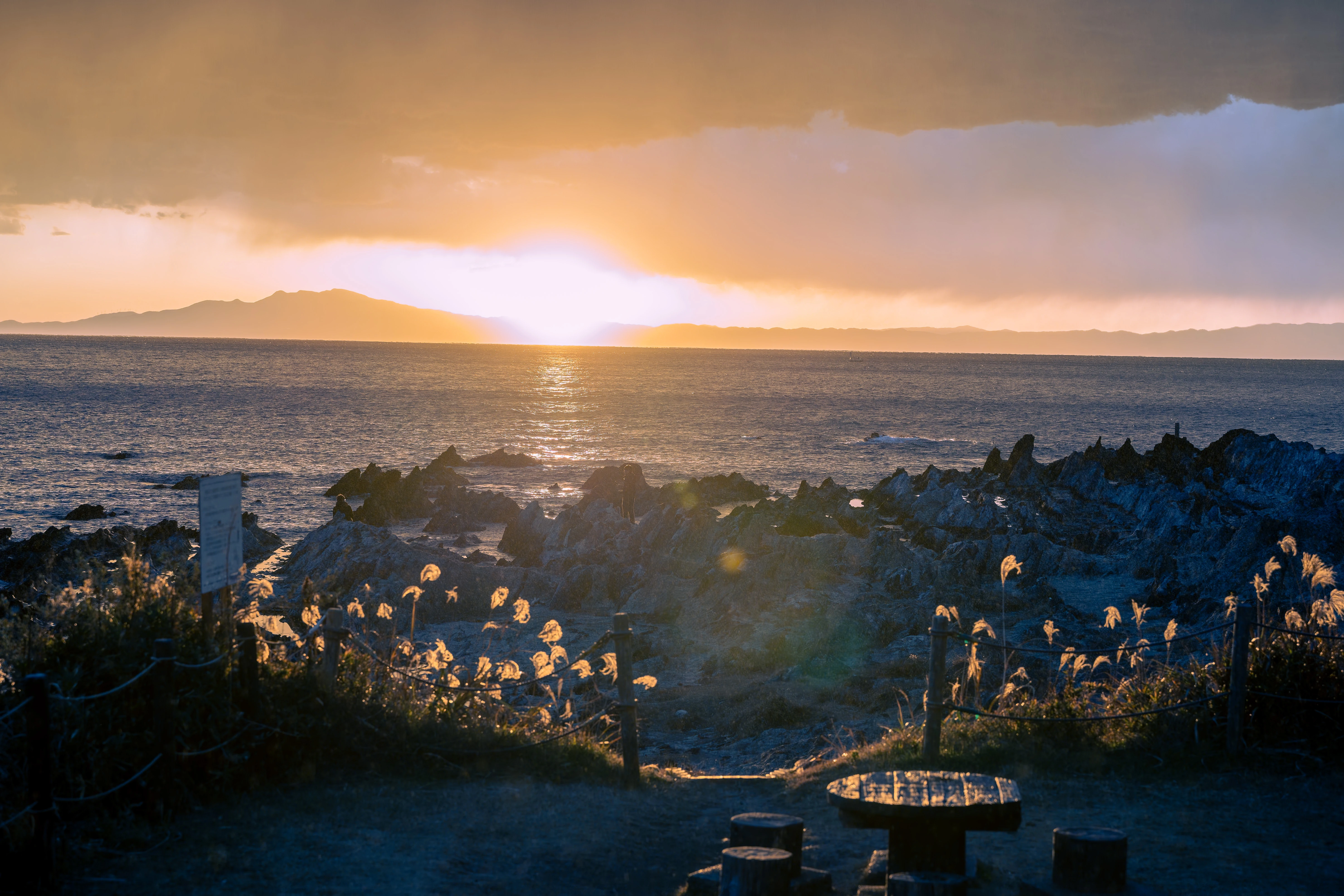 Golden Hour Over a Rocky Shoreline