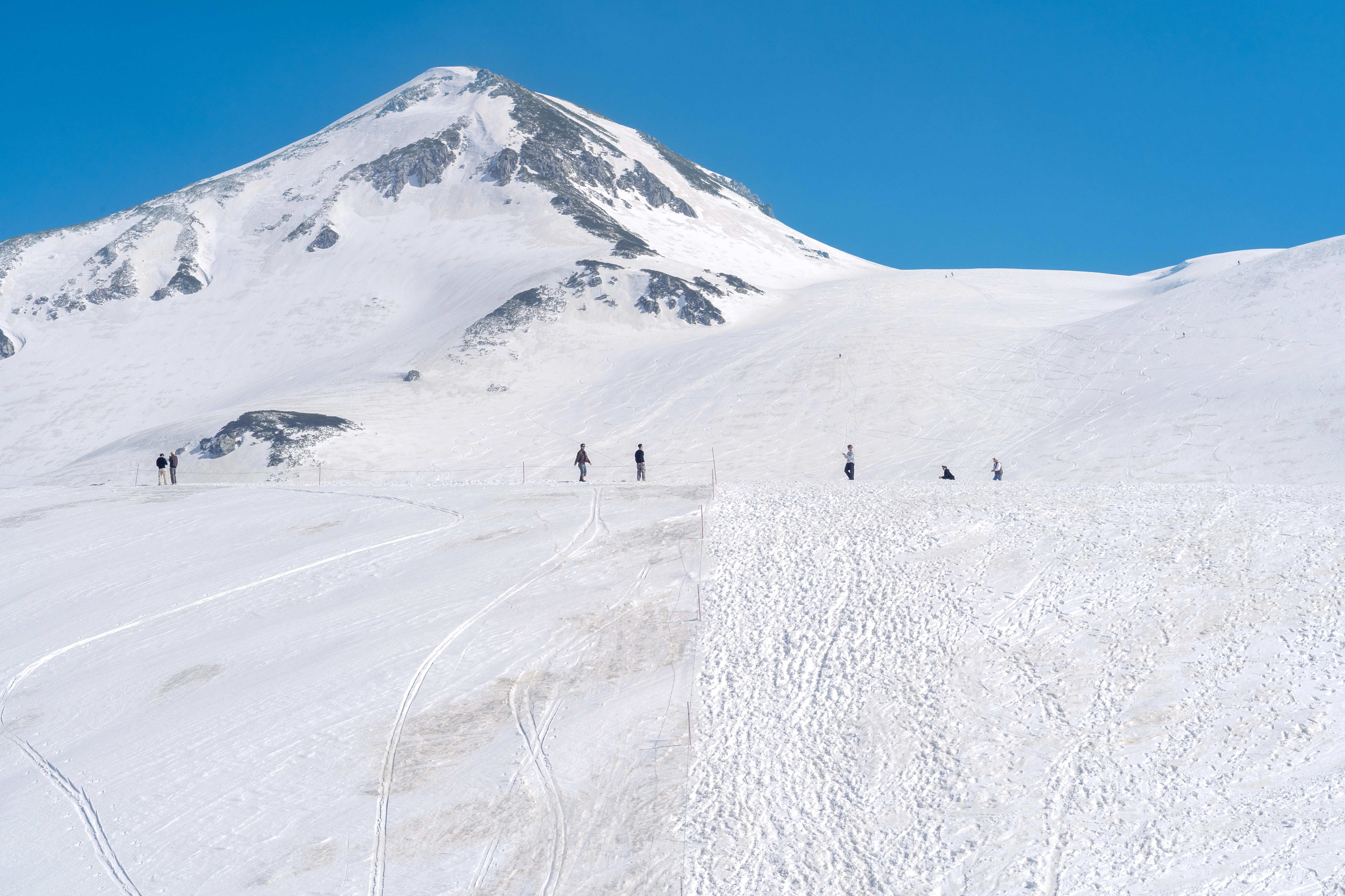 Crisp Spring Afternoon on a Snowy Mountain Slope
