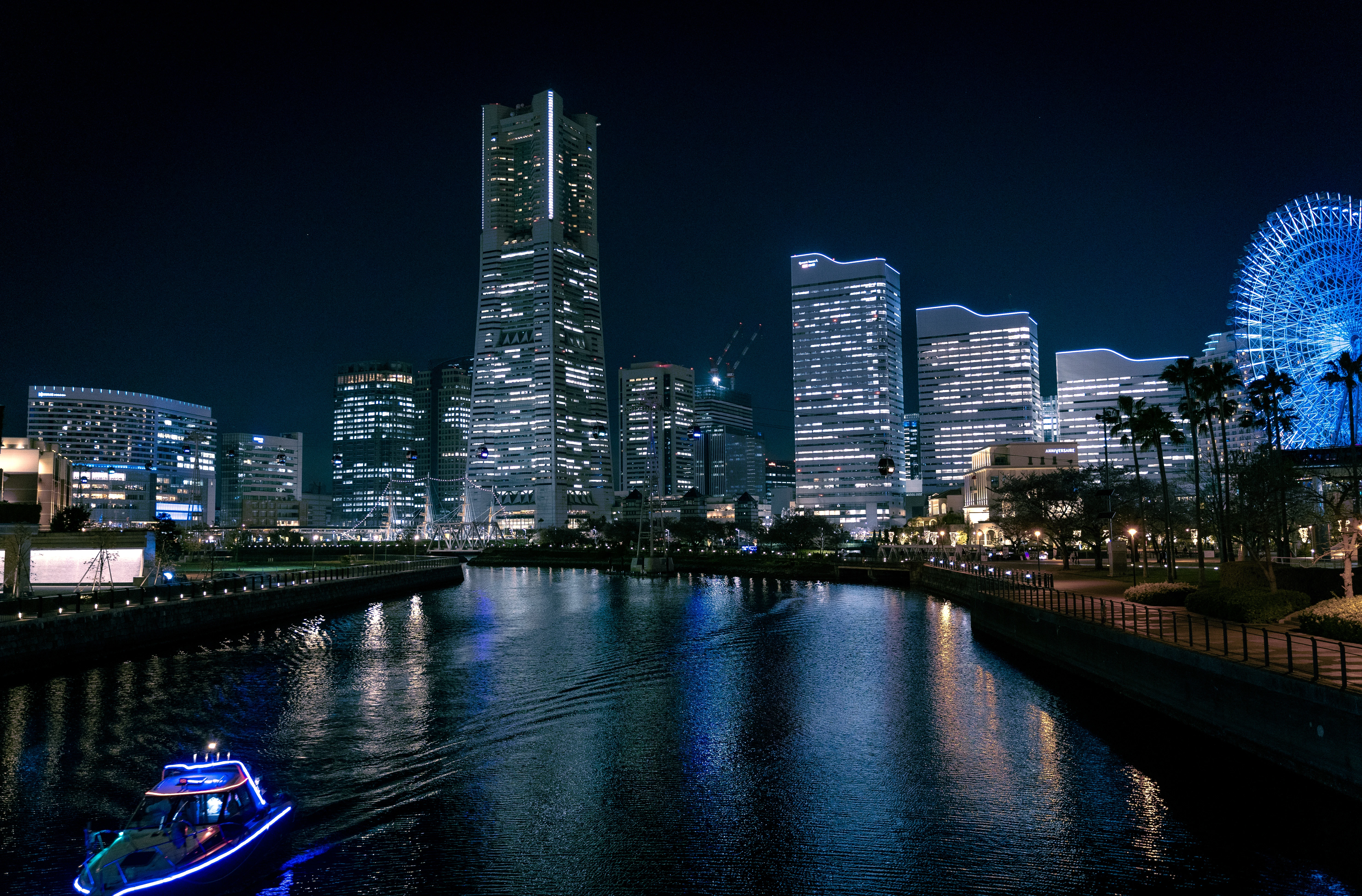 Nocturnal Reflections: Yokohama Skyline and Illuminated Landmark Tower