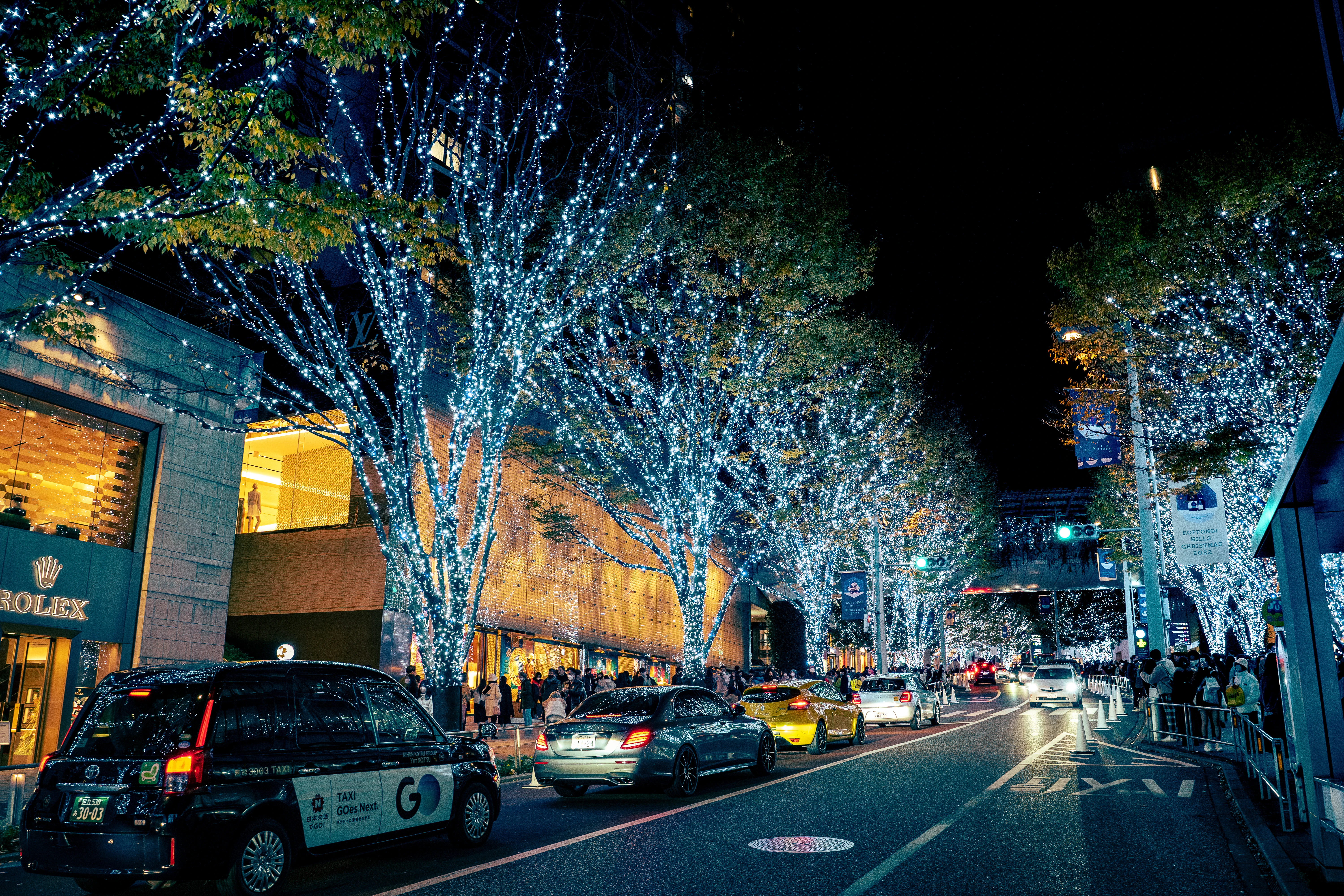 Illuminated Winter Street with Vibrant City Energy