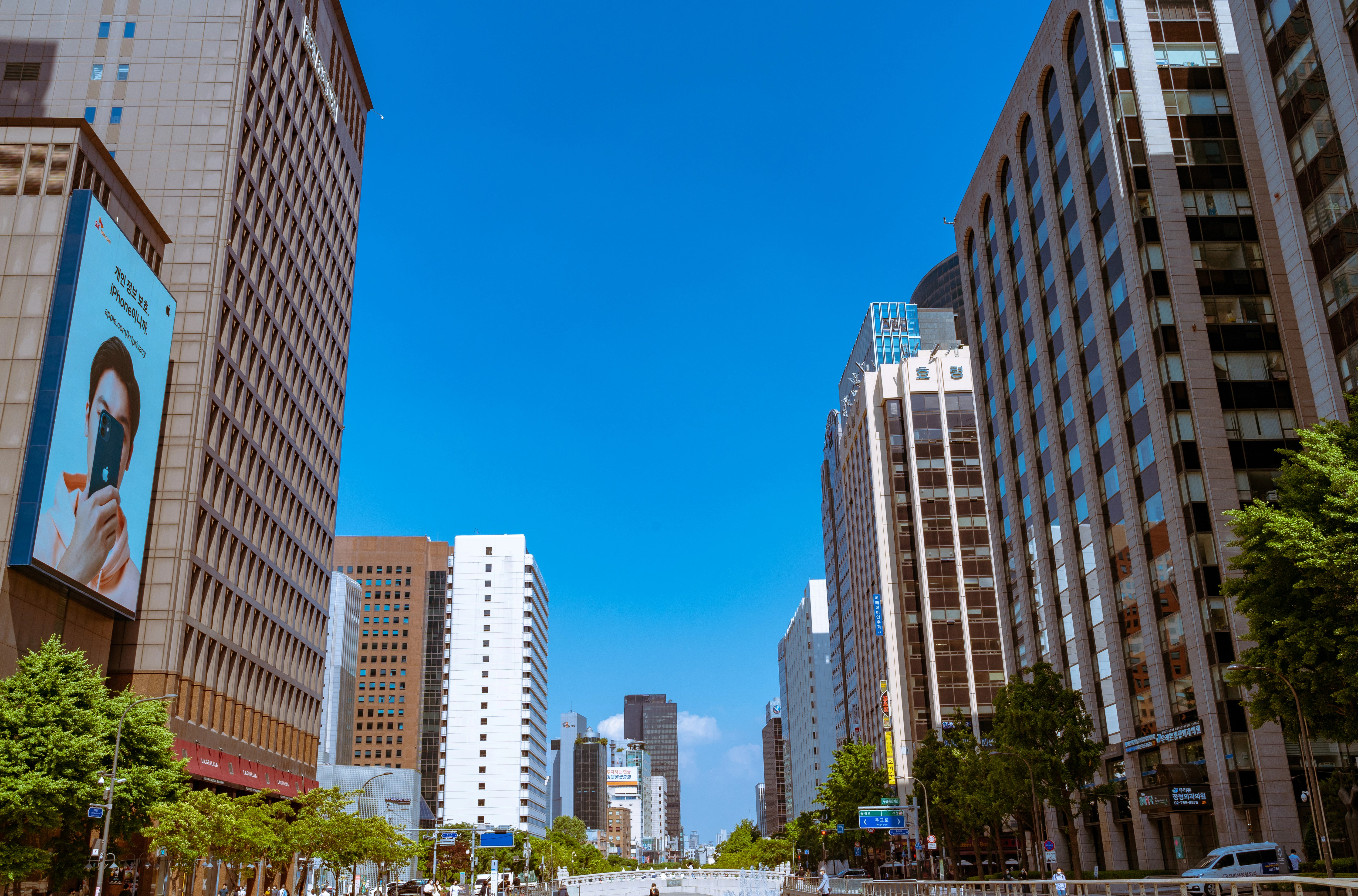 Vibrant Downtown Seoul Under a Bright Blue Sky