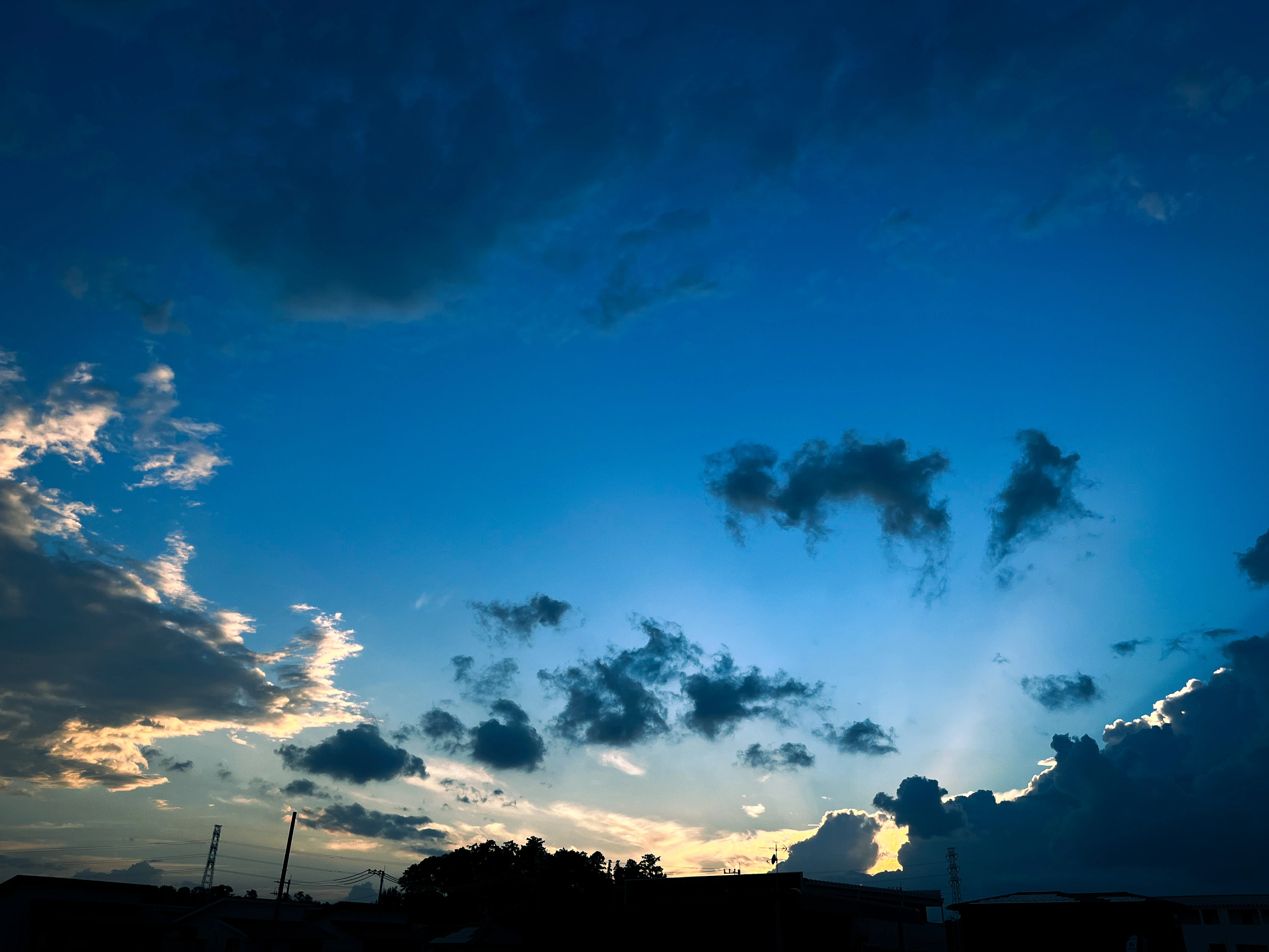 Dramatic Evening Sky with Silhouetted Clouds and Subtle Hues