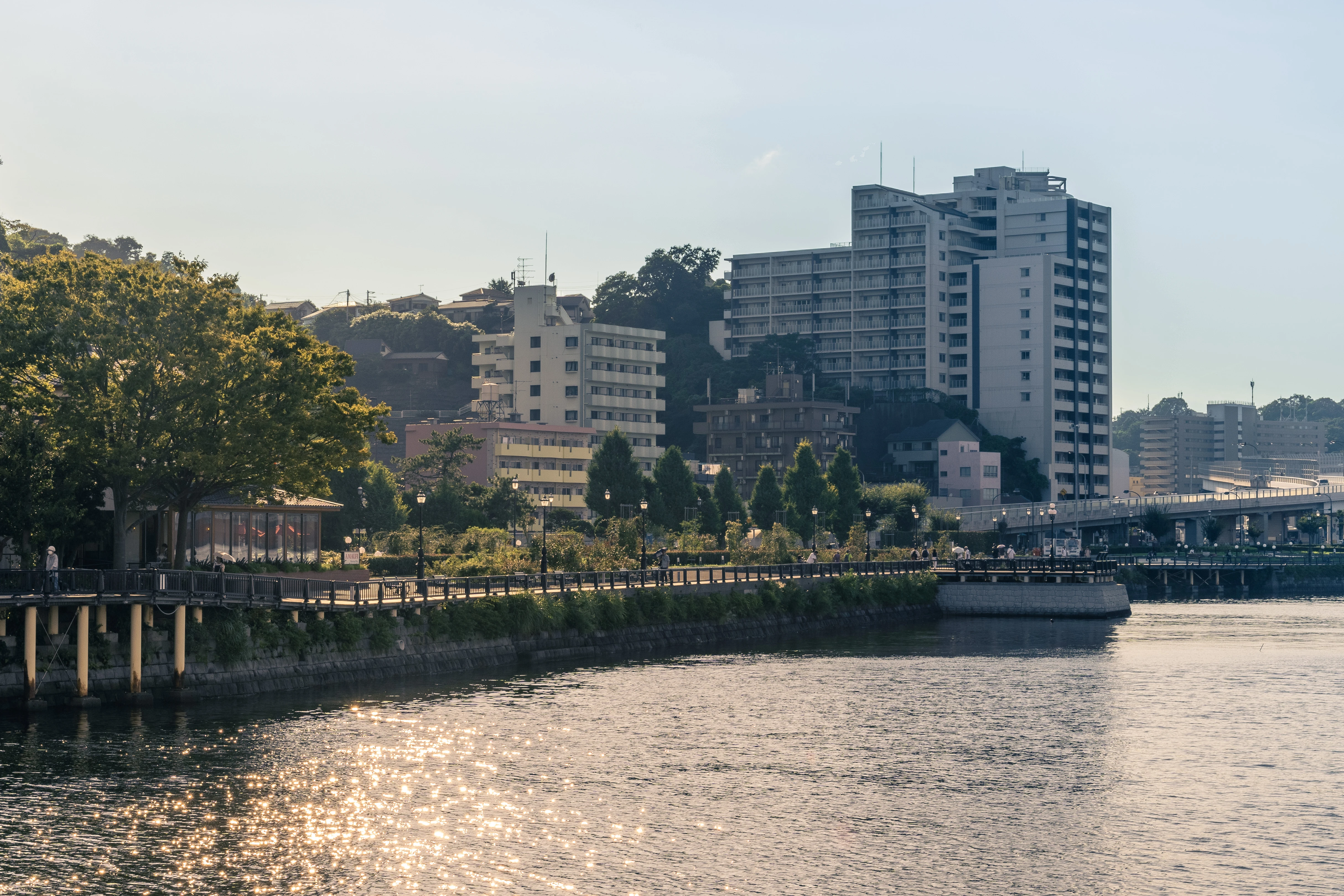 Tranquil Riverside Promenade in the Soft Glow of Dusk