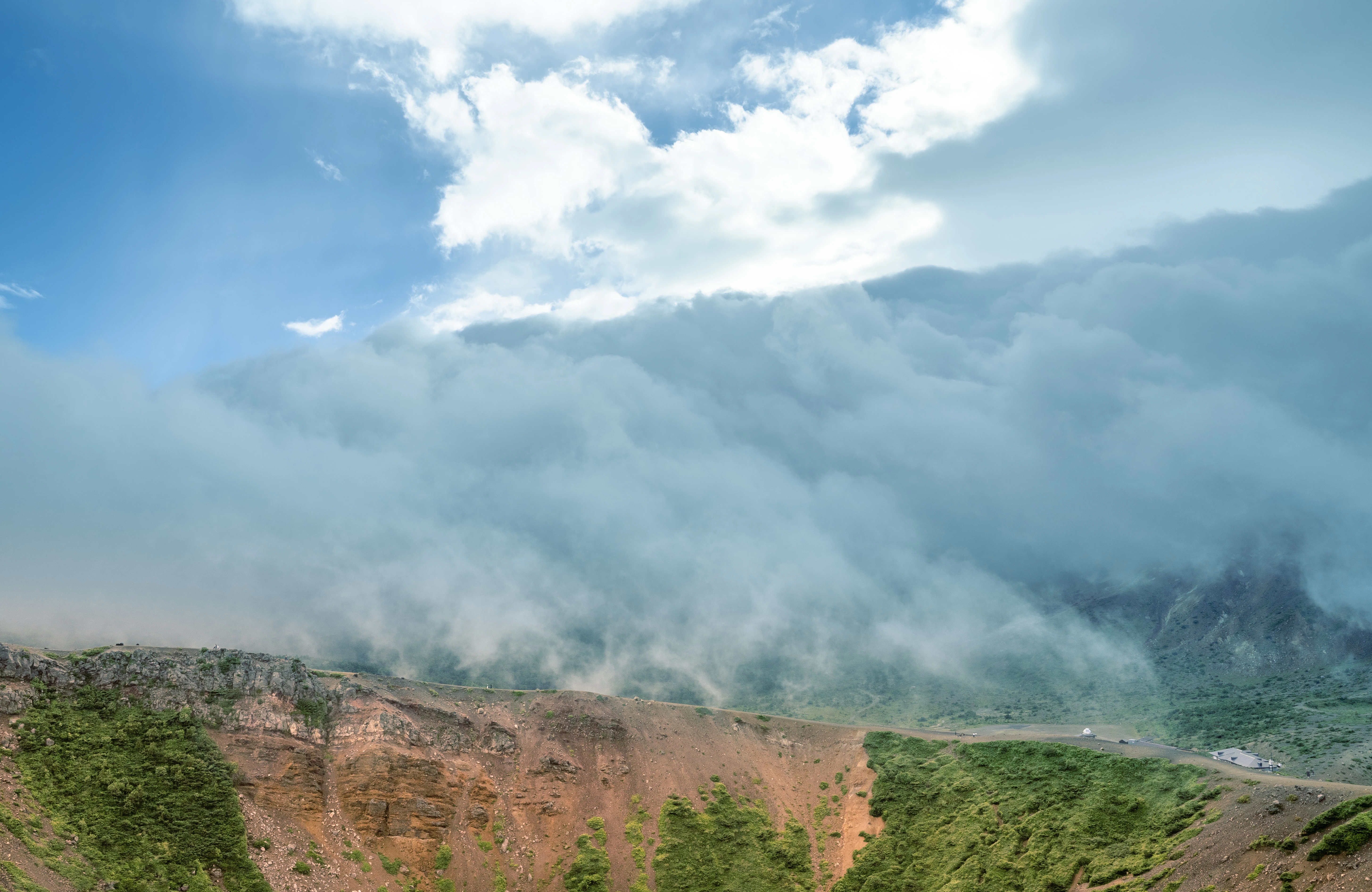 Misty Clouds Over Rocky Mountains