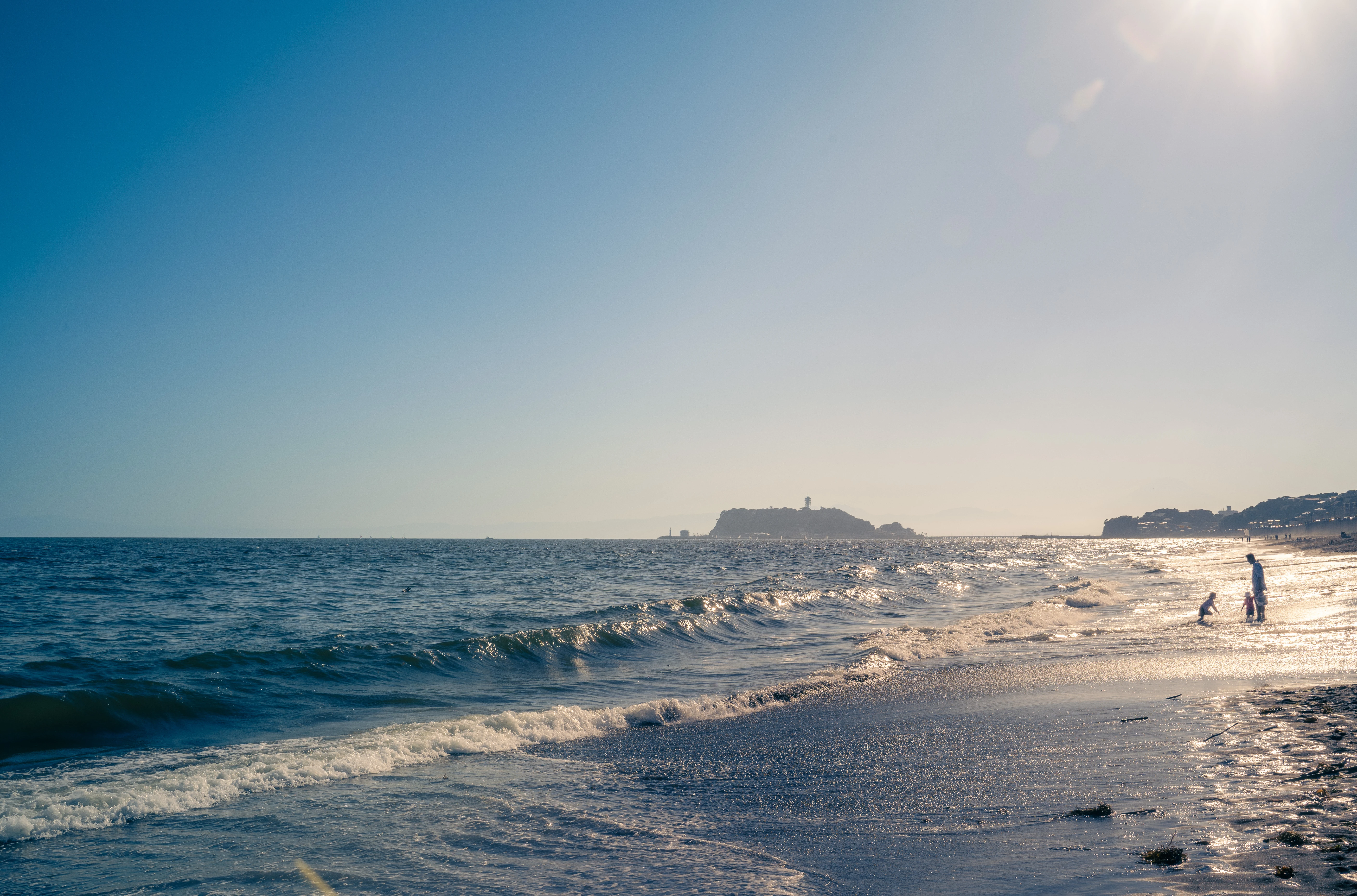 Golden Hour at the Beach with Distant Island
