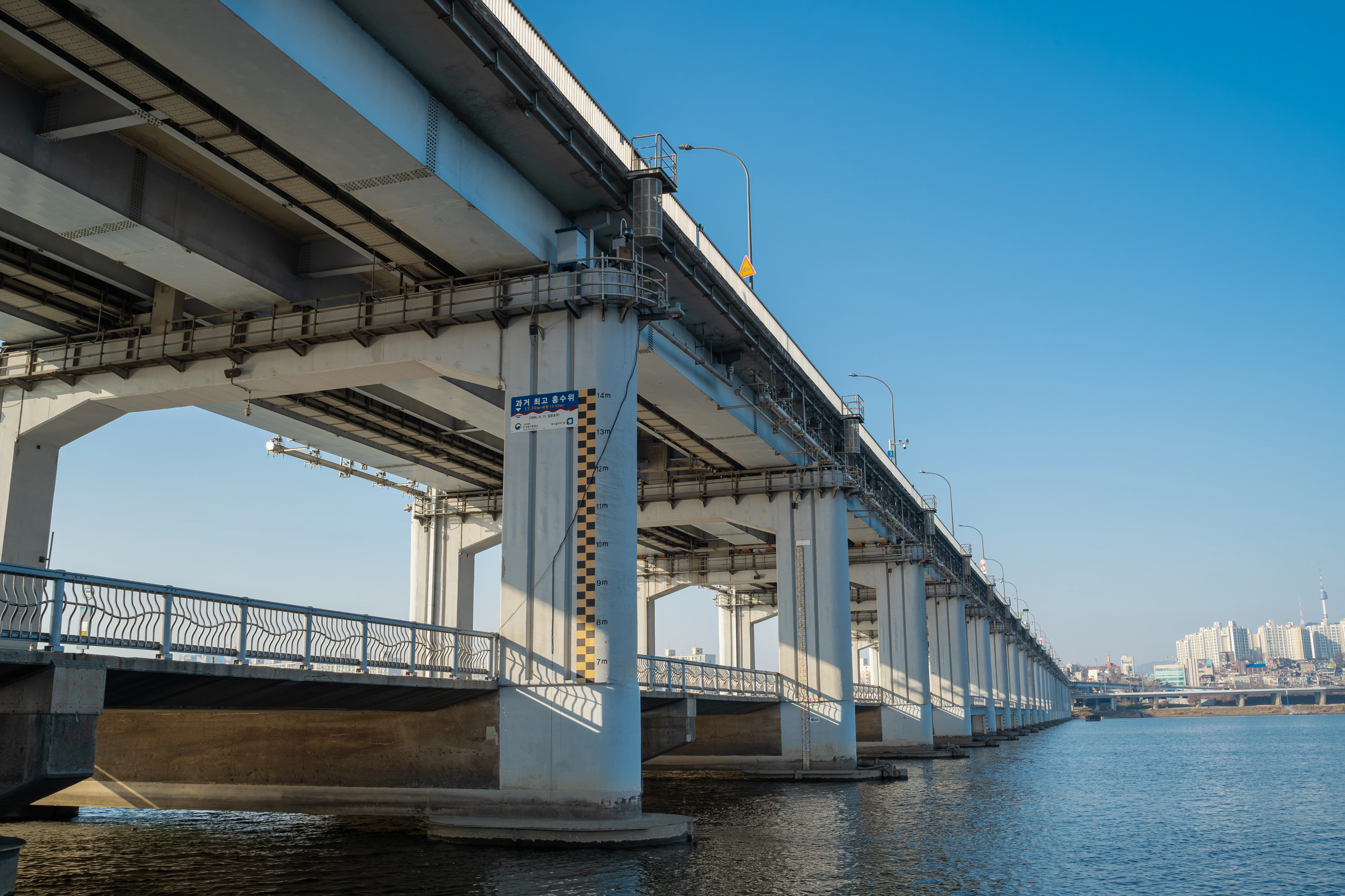 Urban Bridge Stretching Over Calm Waters