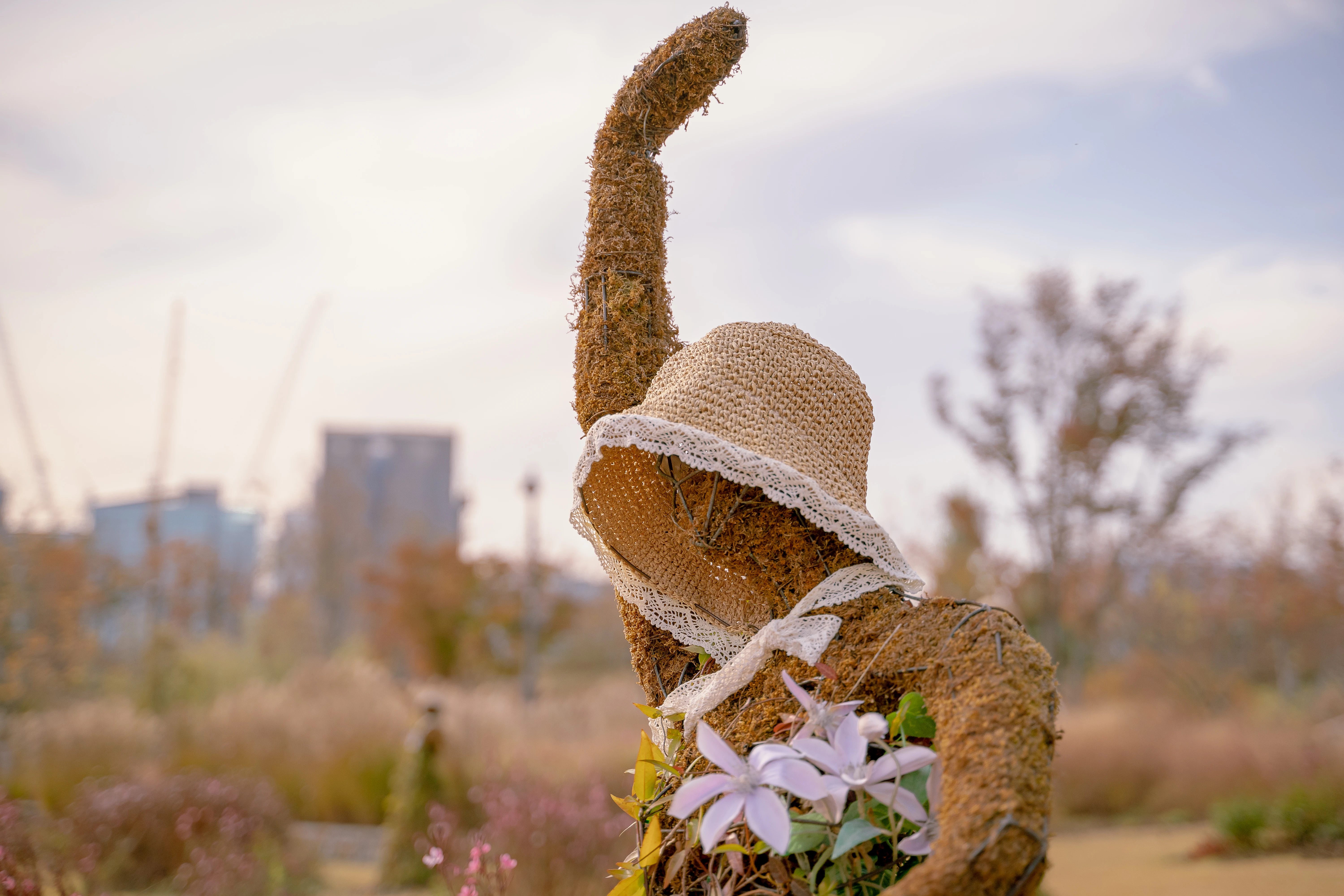 Rustic Scarecrow Adorned with Hat and Nature’s Elegance
