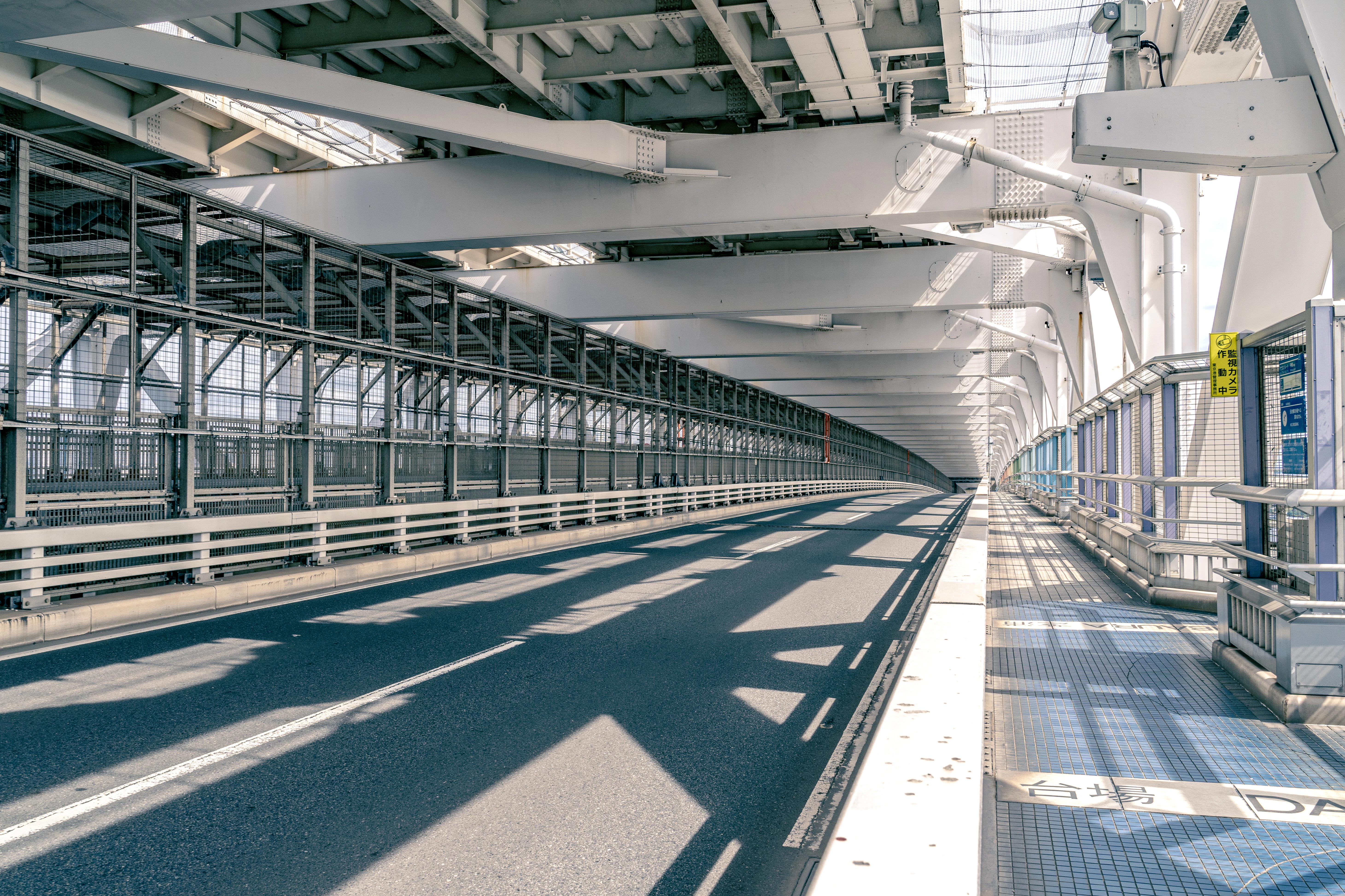 Sunlit Perspectives Inside an Urban Bridge Corridor