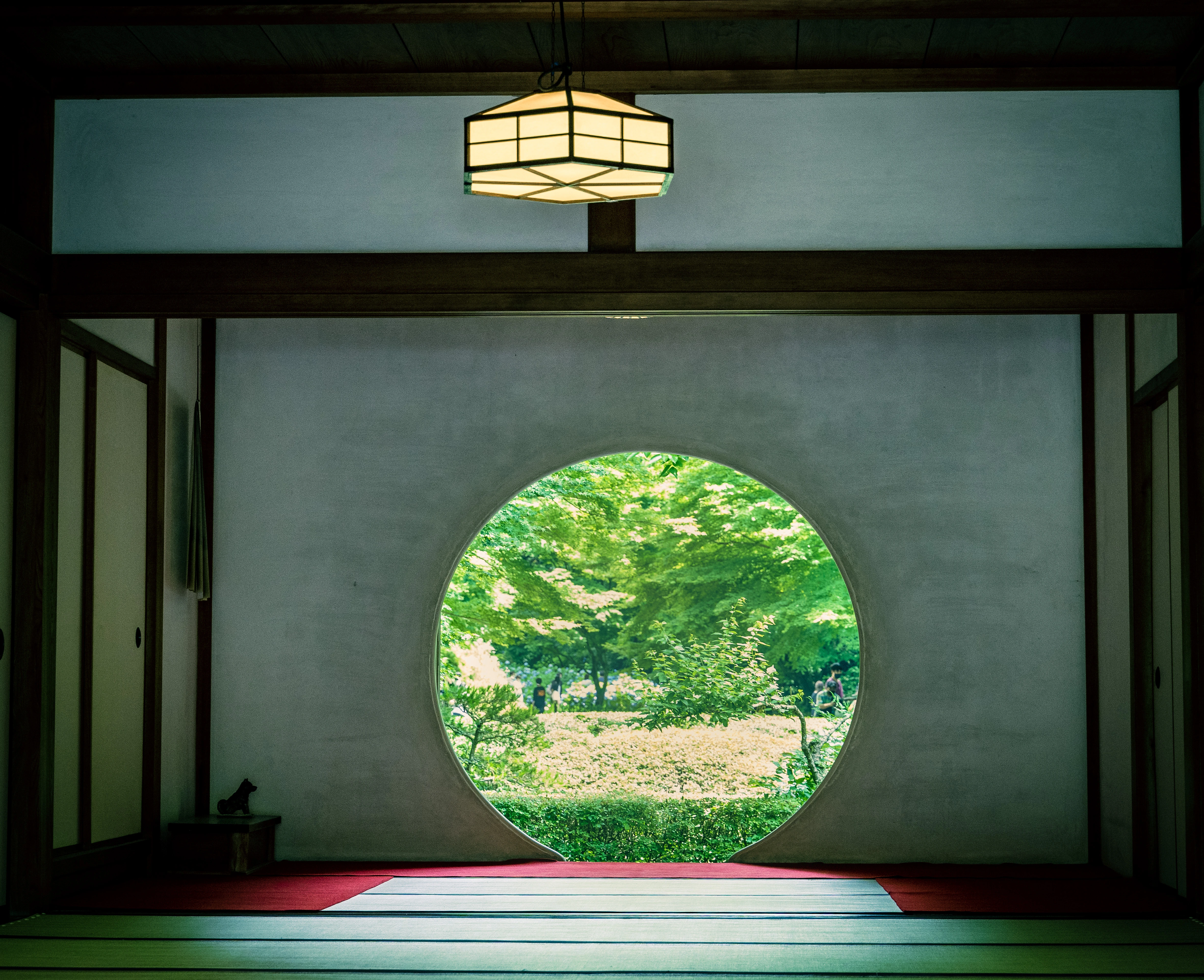 Tranquil View through a Circular Japanese Tea Room Window