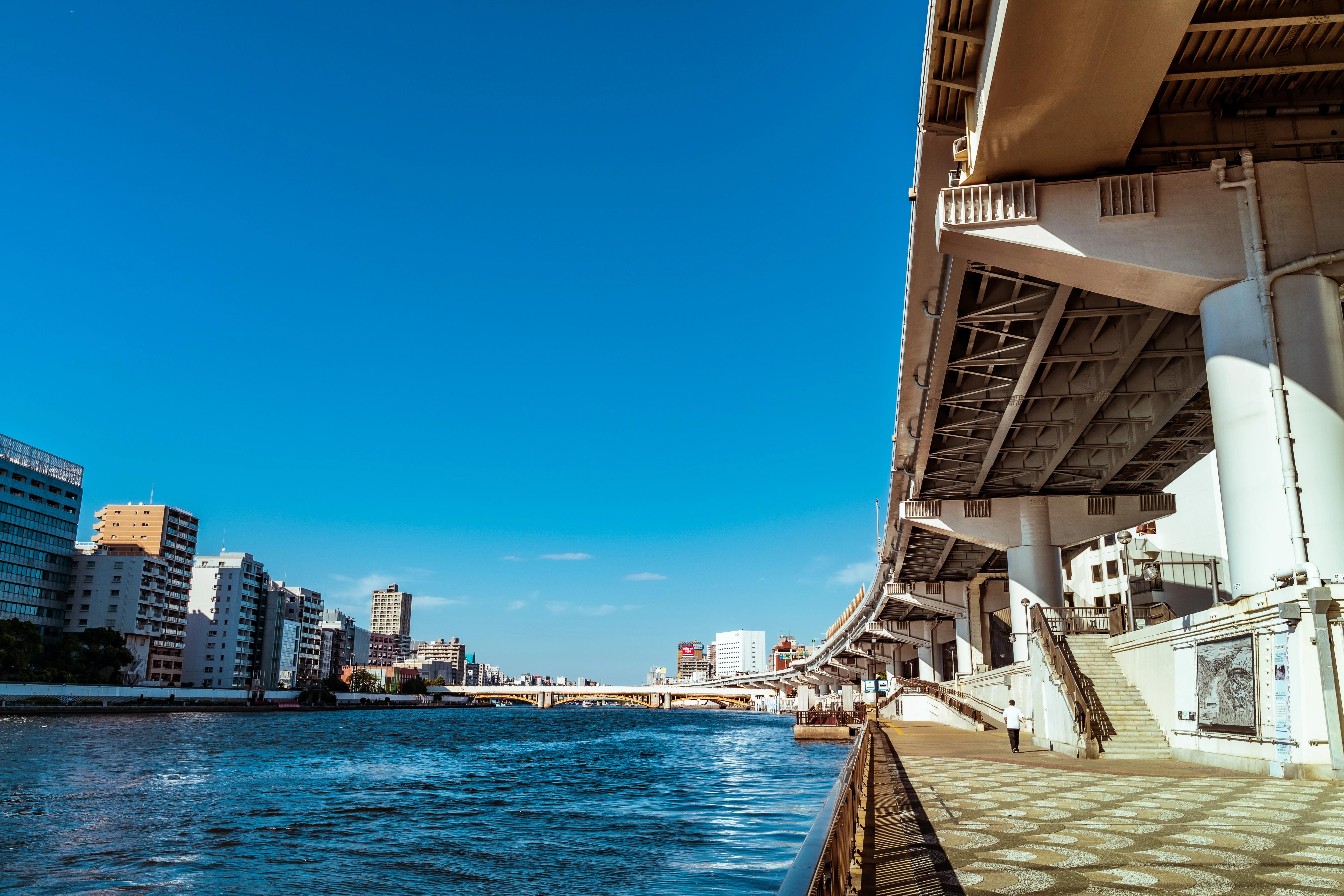 Urban Serenity Along the Riverside Walkway