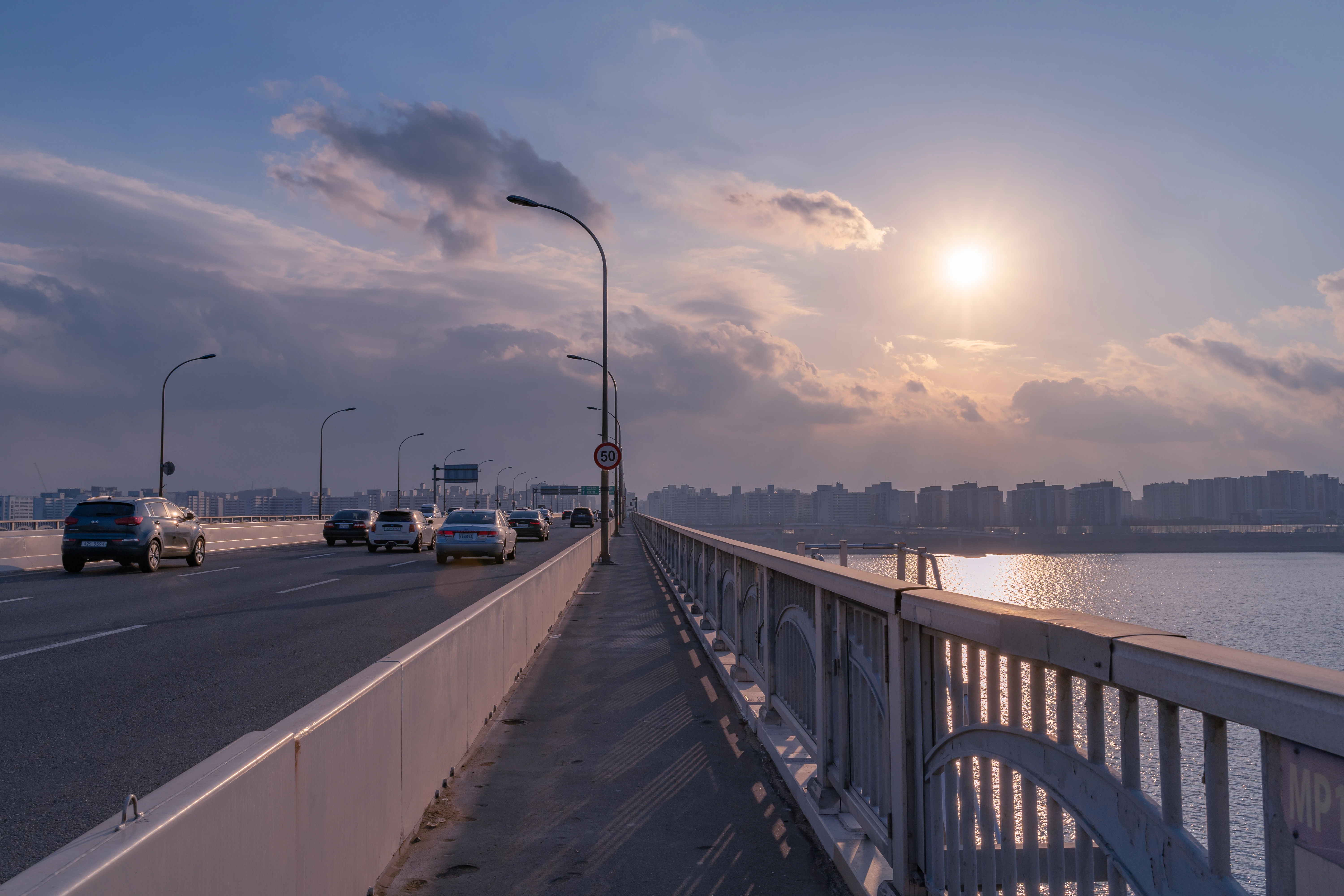 Golden Hour on a Bridge Connecting Cityscapes