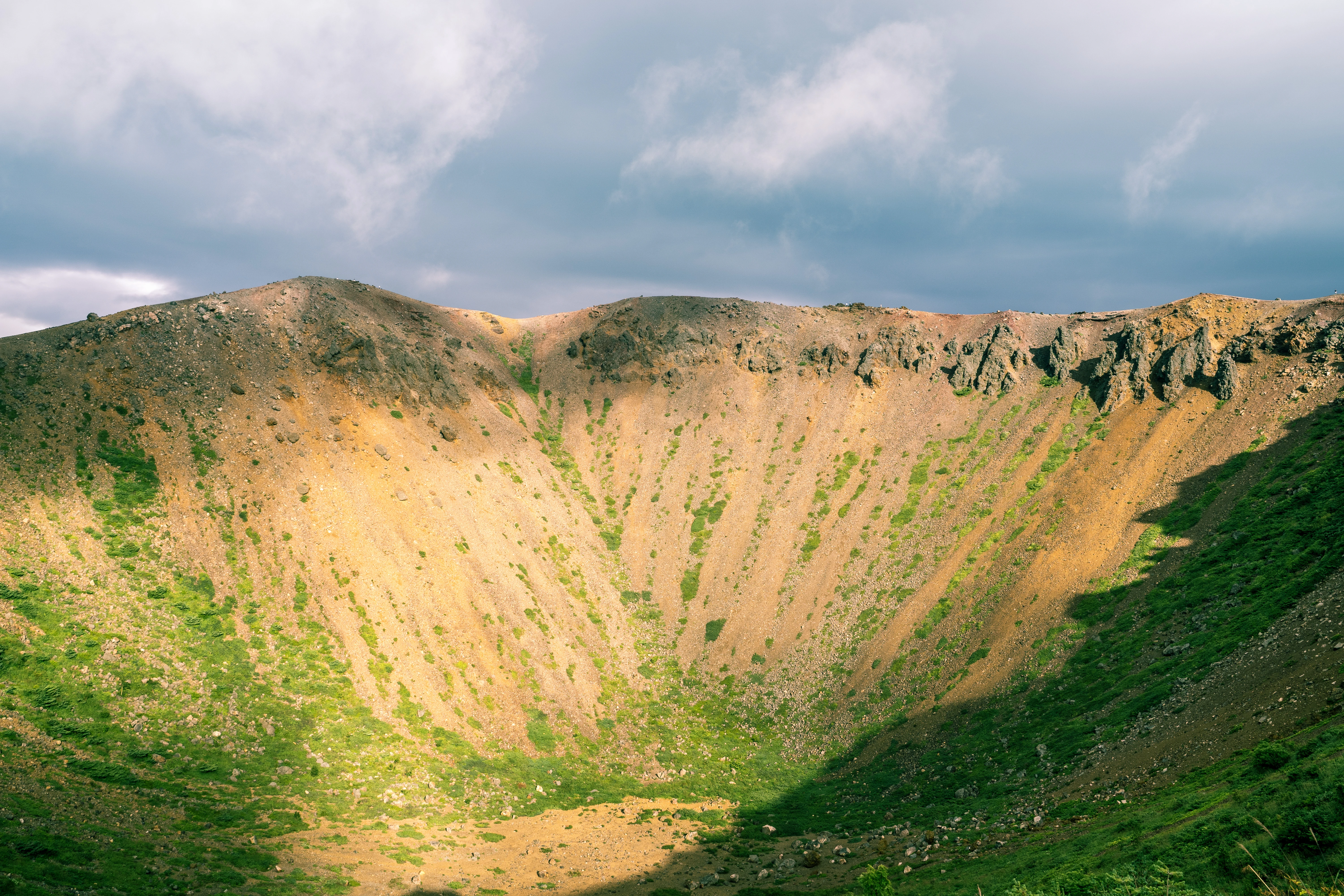 Majestic Volcanic Crater Illuminated by Sunlight